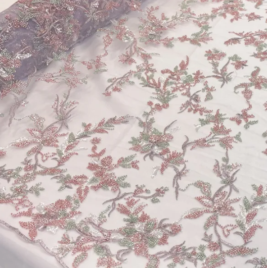Por que Tule Bordado com Pedraria é tão popular em vestidos de festa?